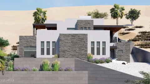 a view of a house with a yard and potted plants