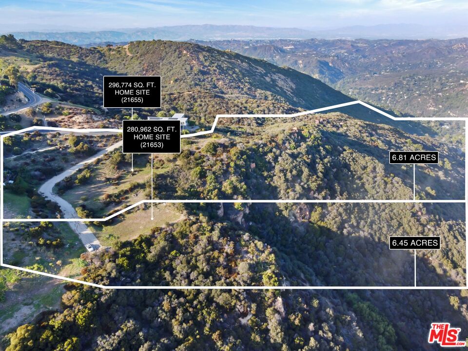21653 Saddle Peak Road Topanga, CA 90290 - Photo 11 of 71 a view of a city from a balcony