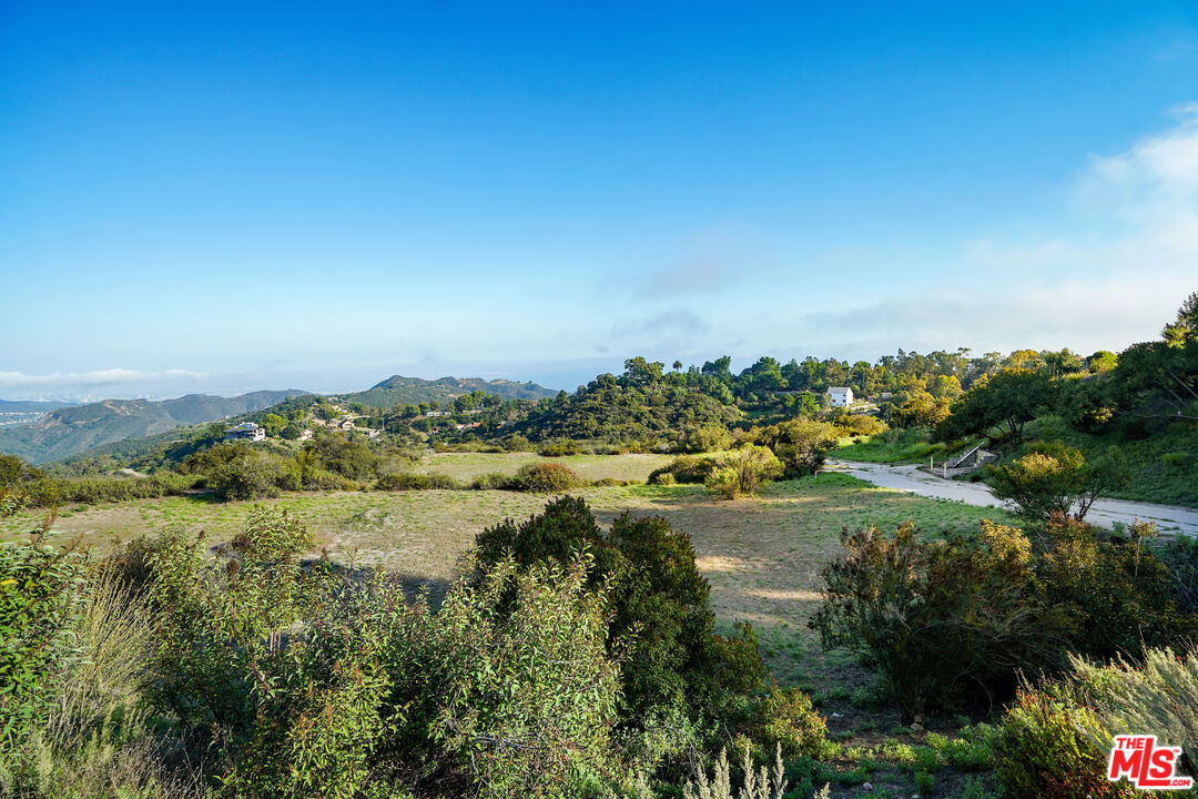21653 Saddle Peak Road Topanga, CA 90290 - Photo 23 of 71 a view of a town with mountains in the background