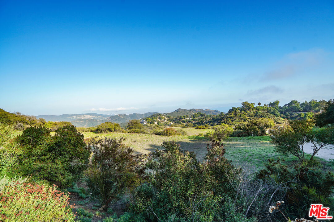 21653 Saddle Peak Road Topanga, CA 90290 - Photo 24 of 71 a view of a lake with a city