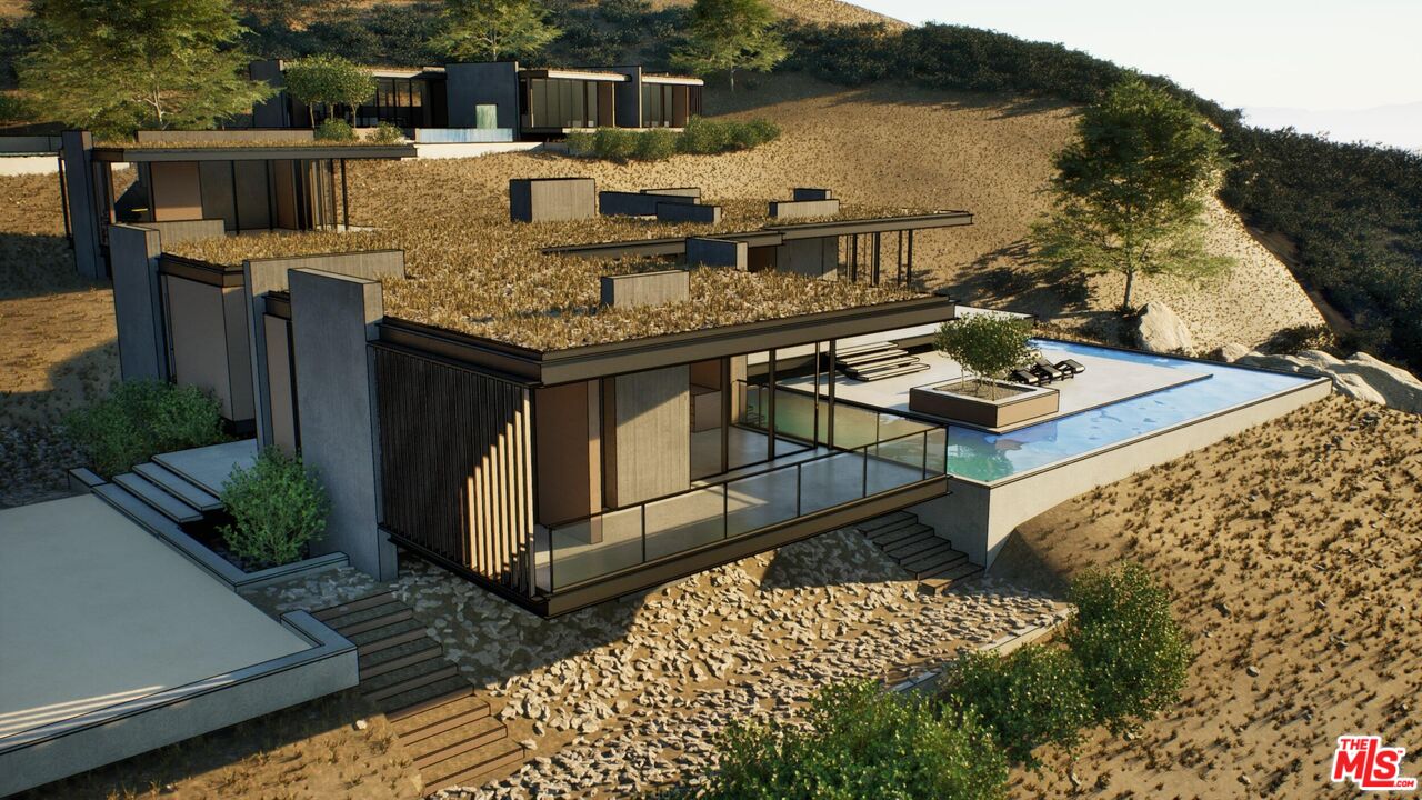 21653 Saddle Peak Road Topanga, CA 90290 - Photo 3 of 71 a terrace of a house with outdoor seating