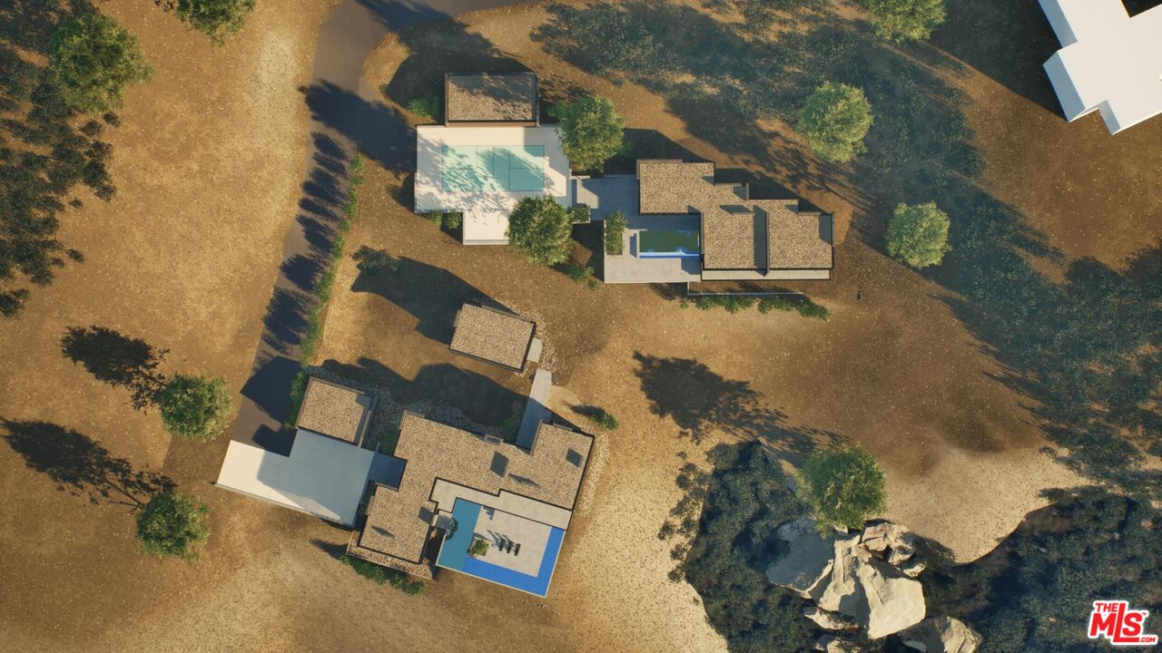 21653 Saddle Peak Road Topanga, CA 90290 - Photo 38 of 71 an aerial view of a house with a yard