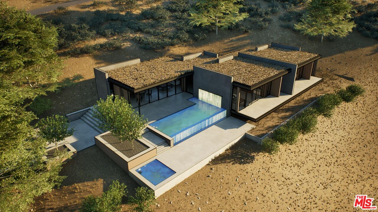 21653 Saddle Peak Road Topanga, CA 90290 - Photo 40 of 71 an aerial view of a house with roof deck