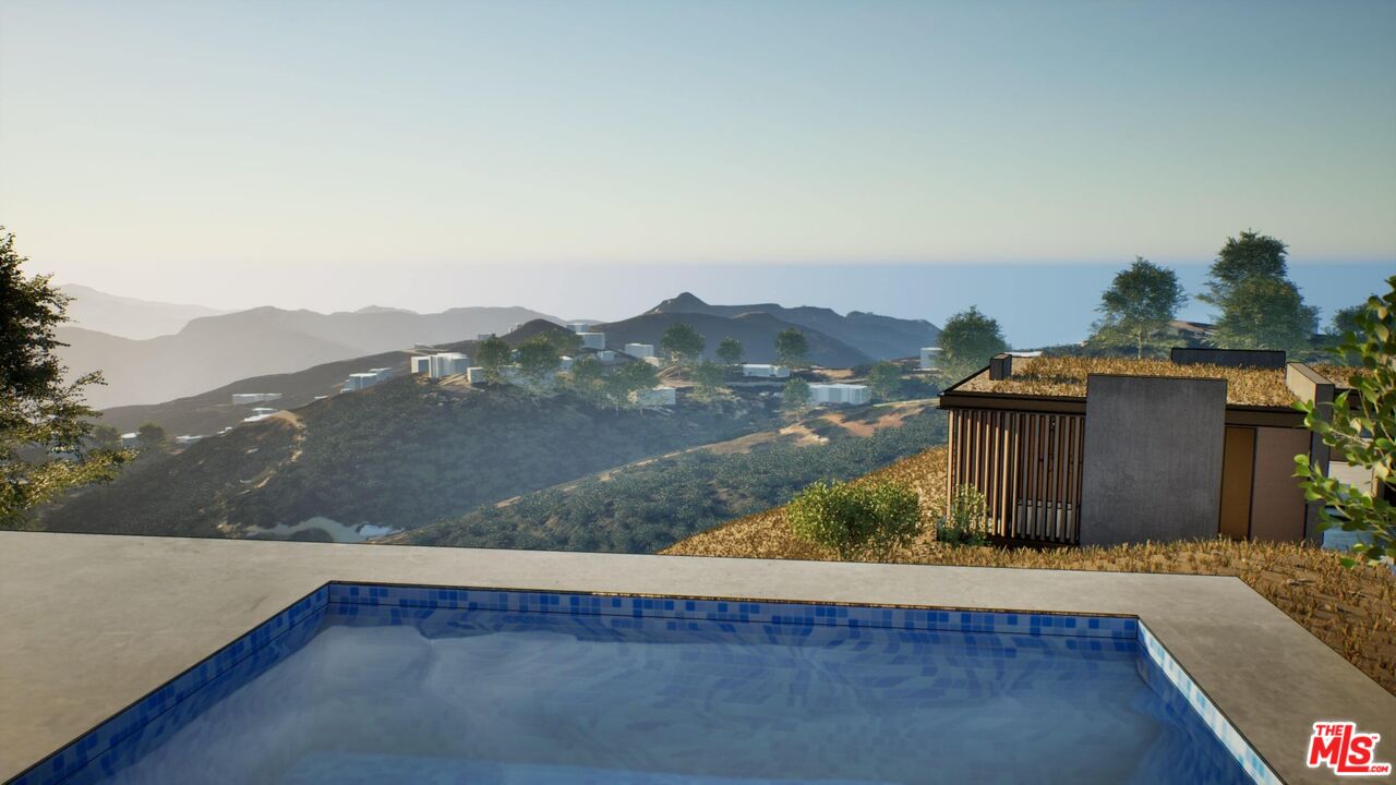21653 Saddle Peak Road Topanga, CA 90290 - Photo 49 of 71 a view of a house with a yard