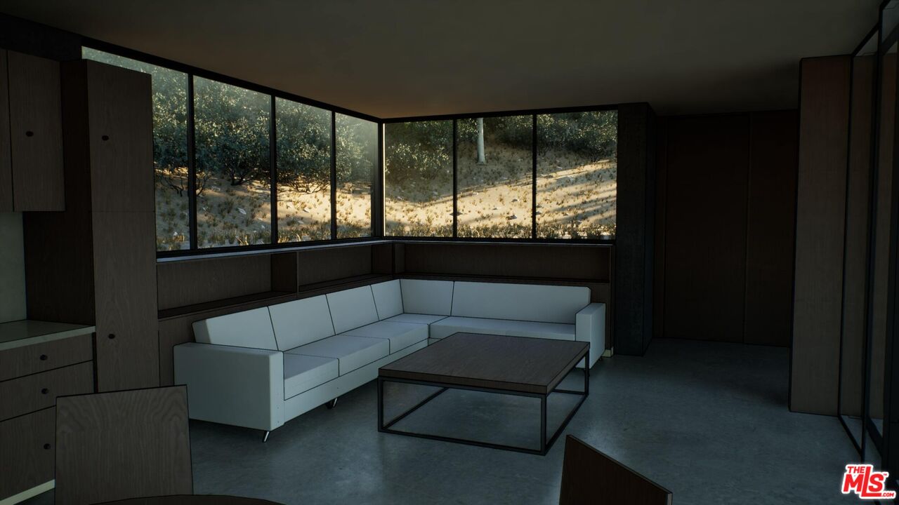 21653 Saddle Peak Road Topanga, CA 90290 - Photo 55 of 71 a living room with furniture and a large window