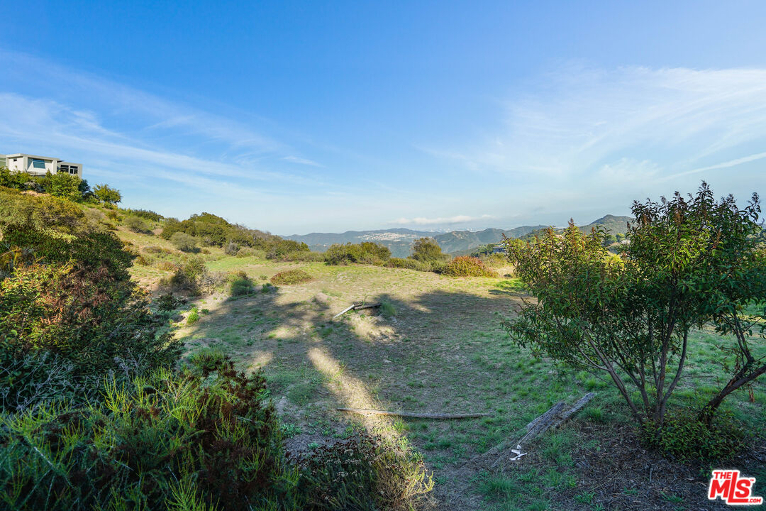 21653 Saddle Peak Road Topanga, CA 90290 - Photo 6 of 71 a view of lake with green space