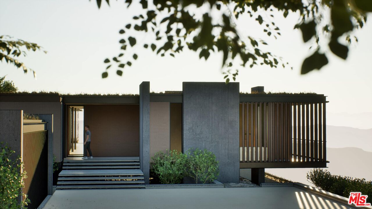 21653 Saddle Peak Road Topanga, CA 90290 - Photo 61 of 71 a front view of a house with entryway
