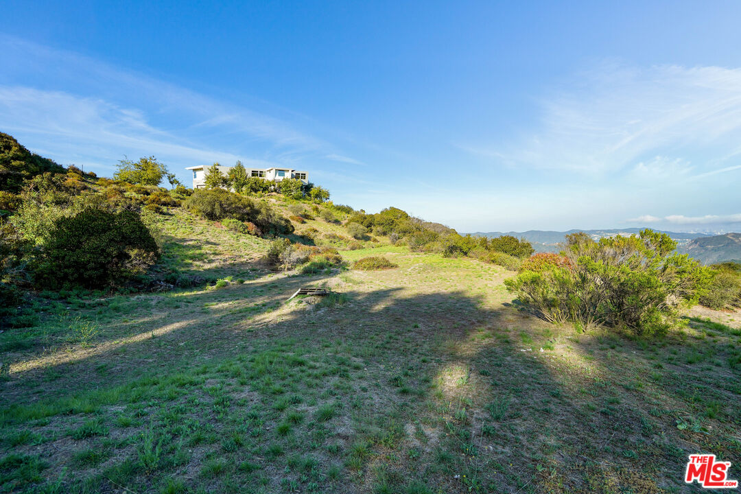 21653 Saddle Peak Road Topanga, CA 90290 - Photo 7 of 71 a view of a field with an ocean