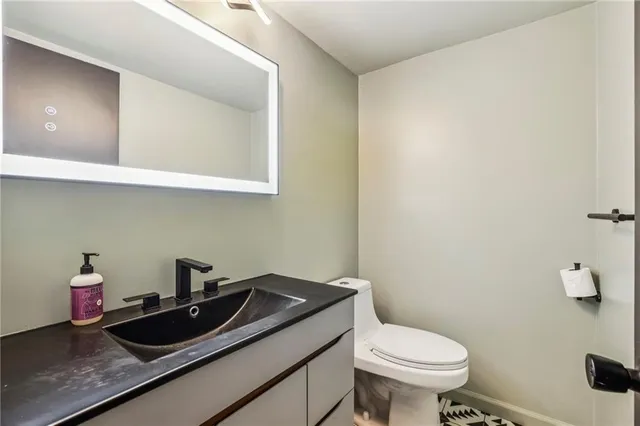 a bathroom with a sink and a toilet