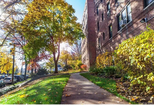 a view of a house with a street