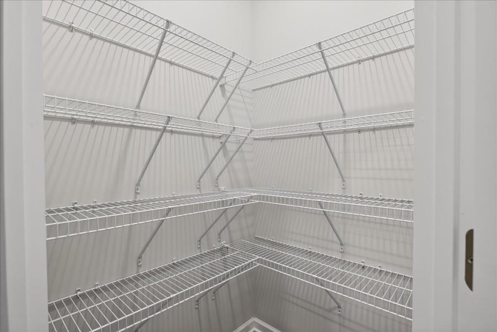 107 Brexley Drive Calhoun, GA 30701 - Photo 11 of 36 a view of a room with racks on the wall