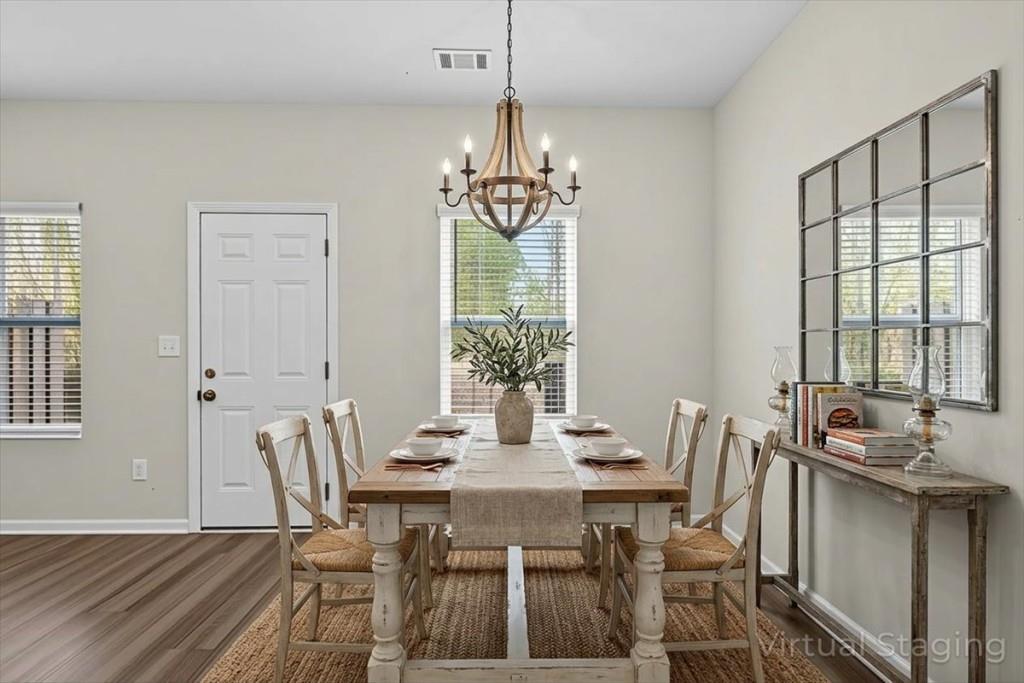 107 Brexley Drive Calhoun, GA 30701 - Photo 15 of 36 a view of a dining room with furniture window and outside view
