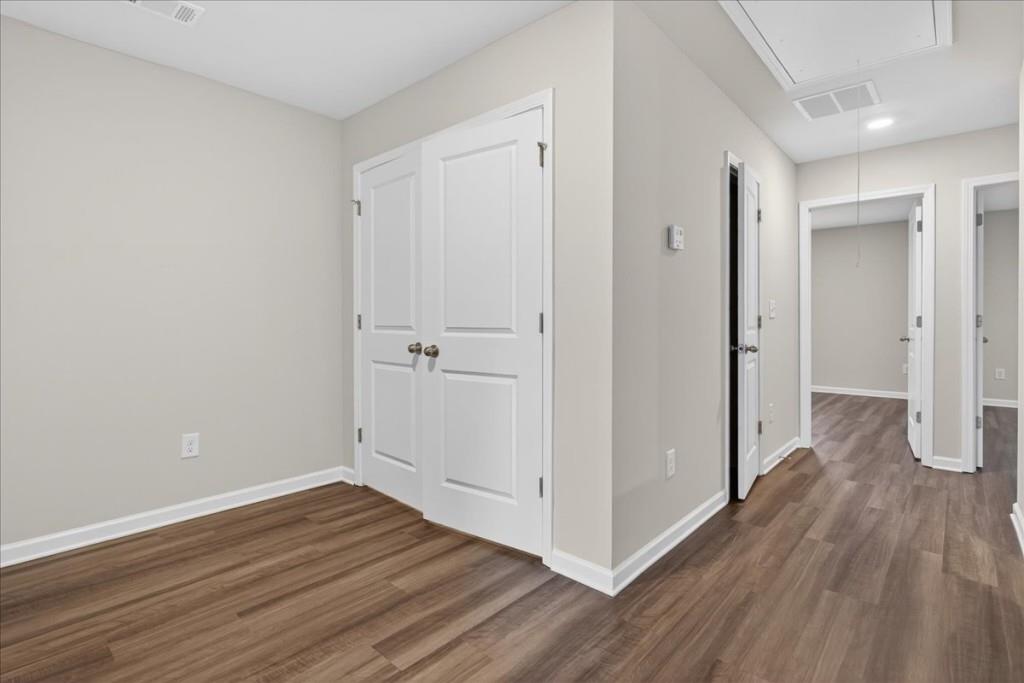 107 Brexley Drive Calhoun, GA 30701 - Photo 17 of 36 a view of a hallway with wooden floor
