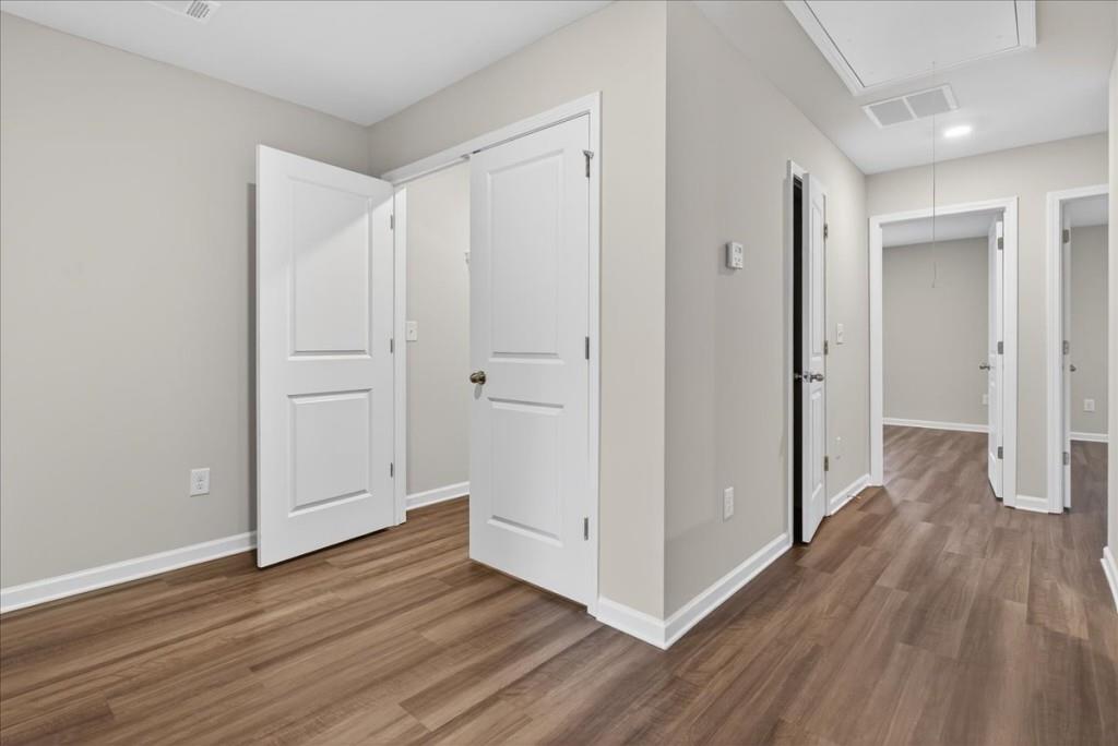 107 Brexley Drive Calhoun, GA 30701 - Photo 18 of 36 a view of a hallway with wooden floor