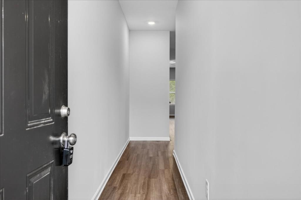 107 Brexley Drive Calhoun, GA 30701 - Photo 2 of 36 a view of a hallway with wooden floor