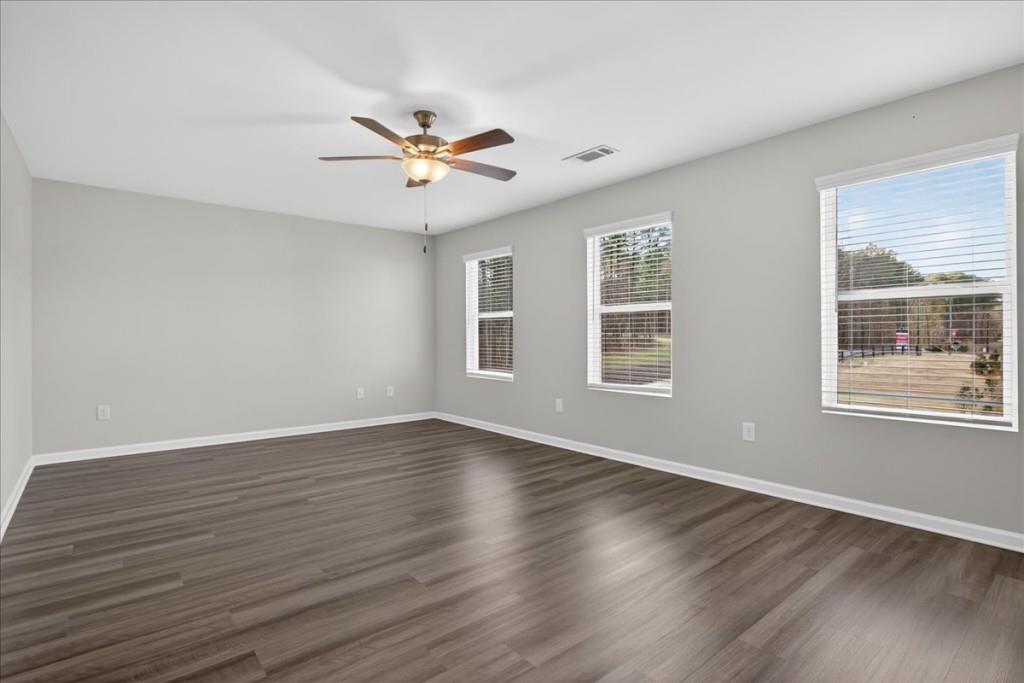 107 Brexley Drive Calhoun, GA 30701 - Photo 21 of 36 a view of an empty room with wooden floor and a window