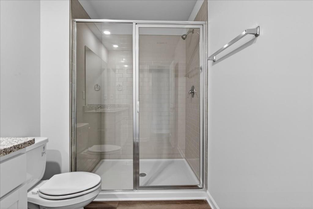 107 Brexley Drive Calhoun, GA 30701 - Photo 26 of 36 a bathroom with a glass shower door