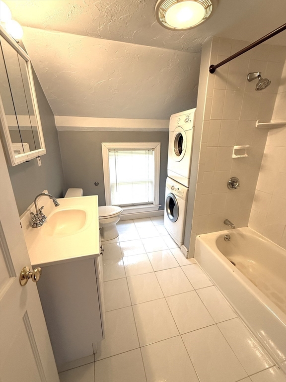 6 Skillings Road, Unit 2 Winchester, MA 01890 - Photo 8 of 8 a bathroom with a tub a sink and a mirror