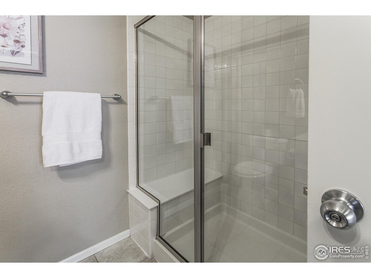 2002 Yearling Drive Fort Collins, CO 80525 - Photo 13 of 40 a bathroom with a shower and a sink