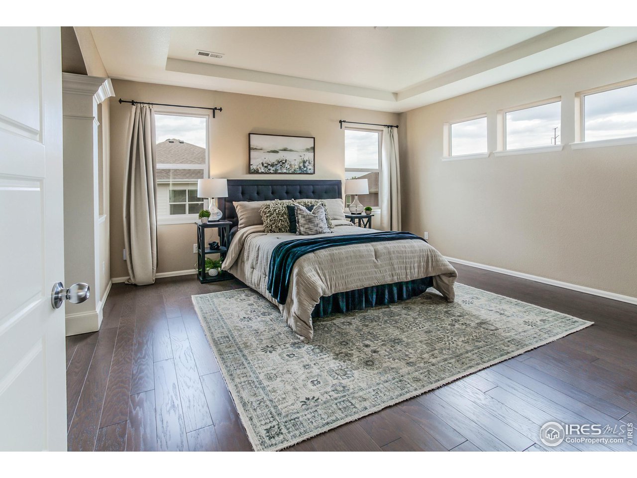 2002 Yearling Drive Fort Collins, CO 80525 - Photo 14 of 40 a living room with a bed furniture and a window