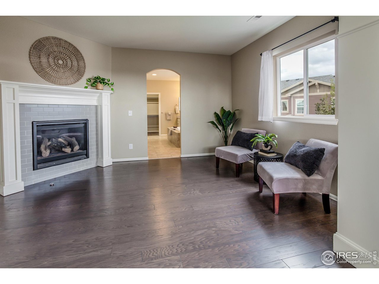2002 Yearling Drive Fort Collins, CO 80525 - Photo 16 of 40 a living room with furniture and a fireplace