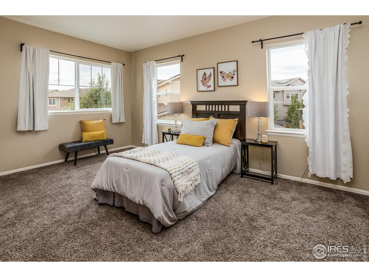 2002 Yearling Drive Fort Collins, CO 80525 - Photo 19 of 40 a bedroom with a bed and a window