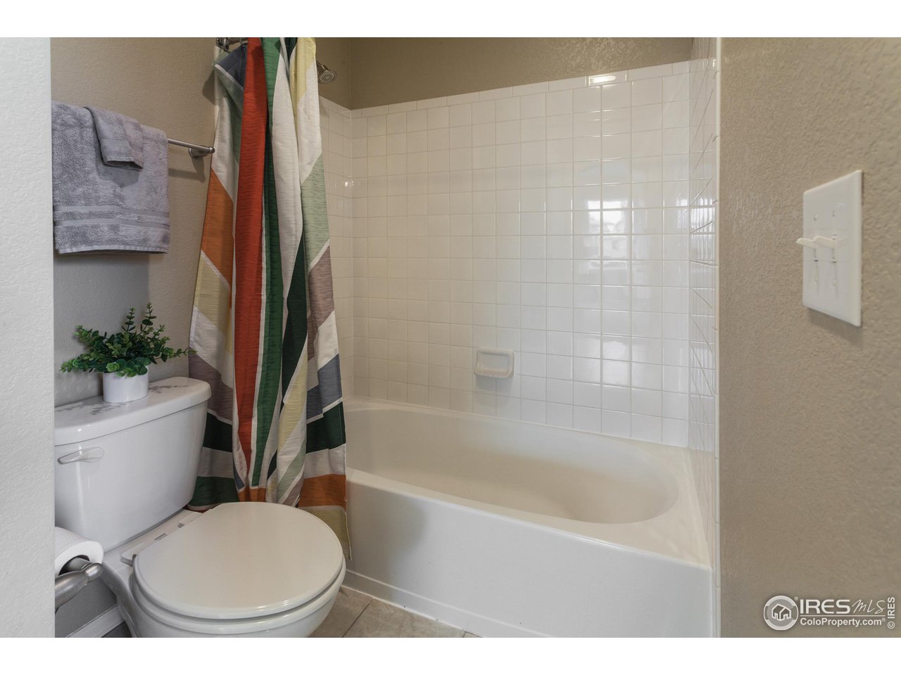 2002 Yearling Drive Fort Collins, CO 80525 - Photo 21 of 40 a bathroom with a toilet and a bathtub