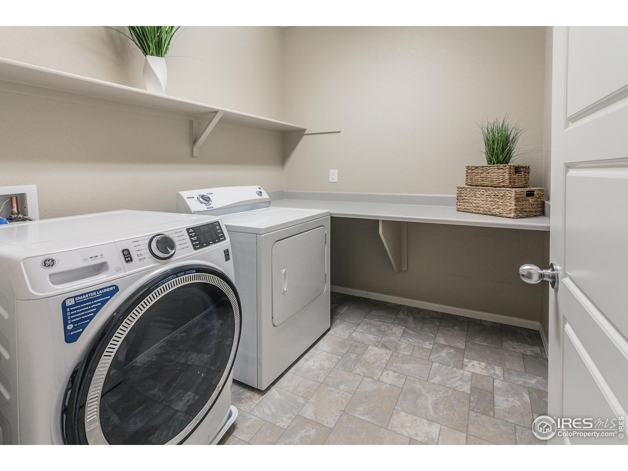 2002 Yearling Drive Fort Collins, CO 80525 - Photo 24 of 40 a utility room with dryer and washer