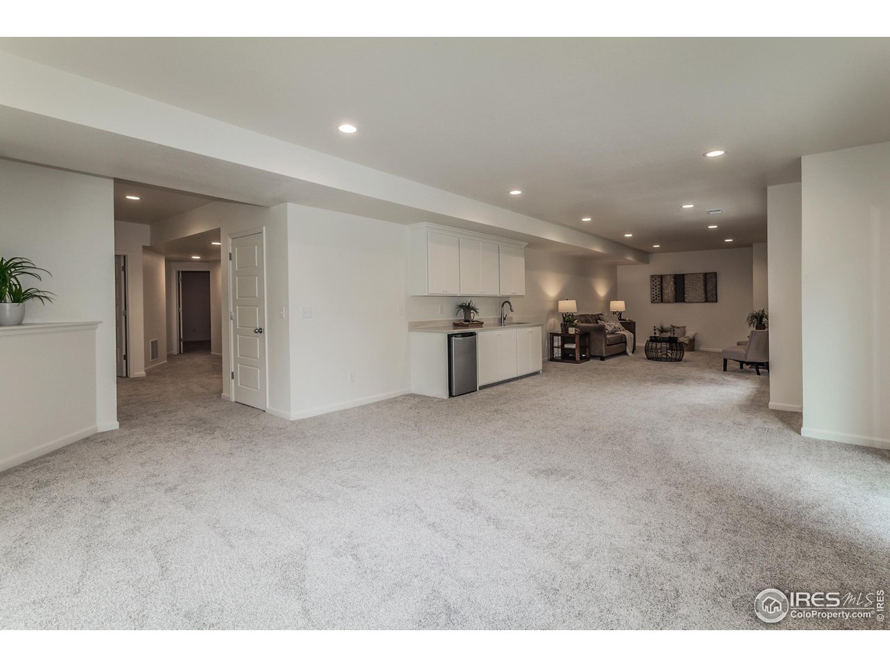 2002 Yearling Drive Fort Collins, CO 80525 - Photo 26 of 40 a view of kitchen with furniture and a refrigerator