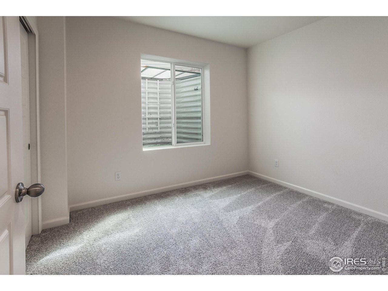 2002 Yearling Drive Fort Collins, CO 80525 - Photo 28 of 40 a view of an empty room with a window