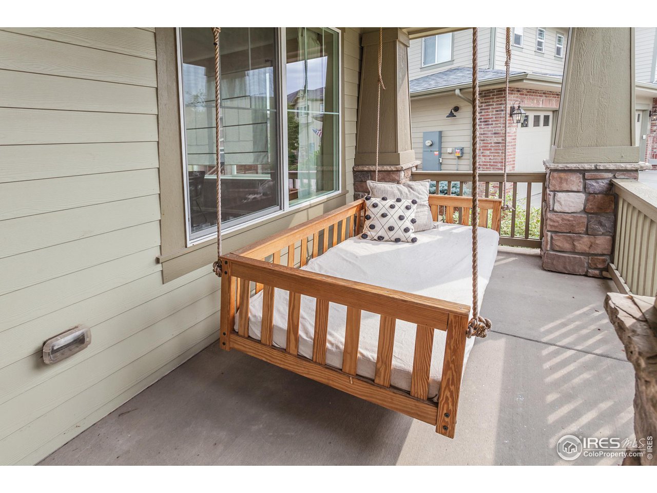 2002 Yearling Drive Fort Collins, CO 80525 - Photo 3 of 40 a balcony with table and chairs