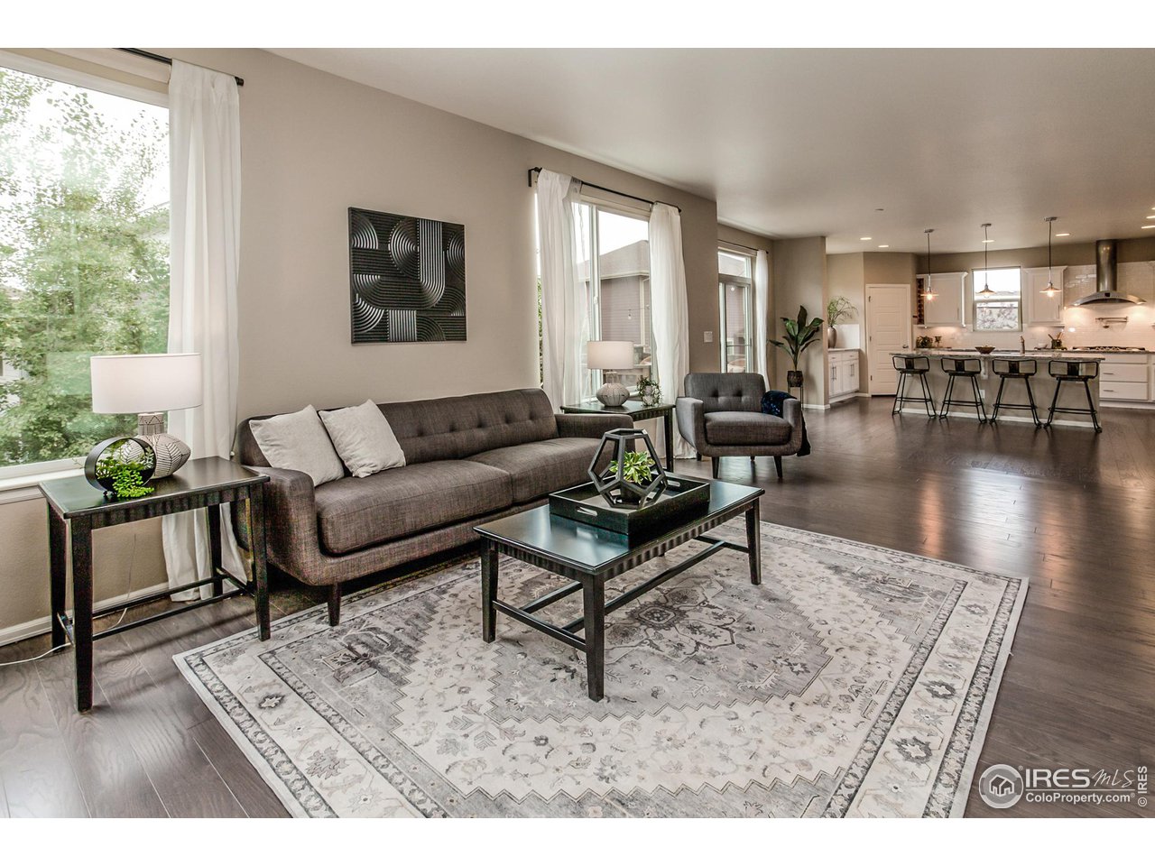 2002 Yearling Drive Fort Collins, CO 80525 - Photo 4 of 40 a living room with furniture and a large window