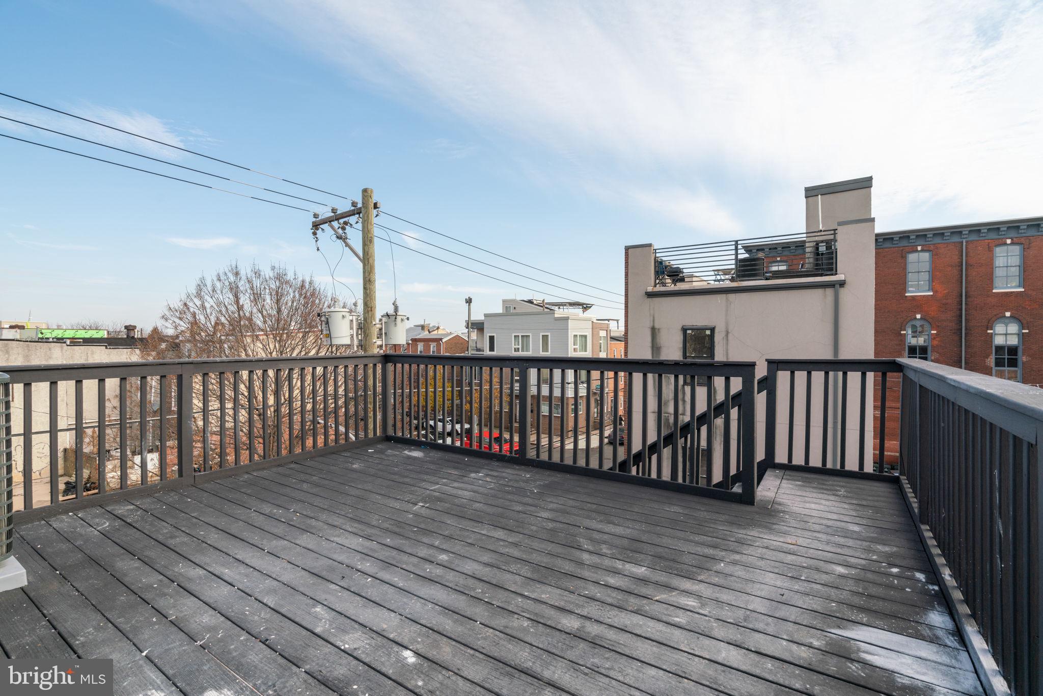 1873 Frankford Avenue, Unit 3F Philadelphia, PA 19125 - Photo 6 of 14 a view of a balcony with wooden floor