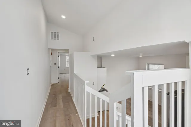 a view of hallway with stairs