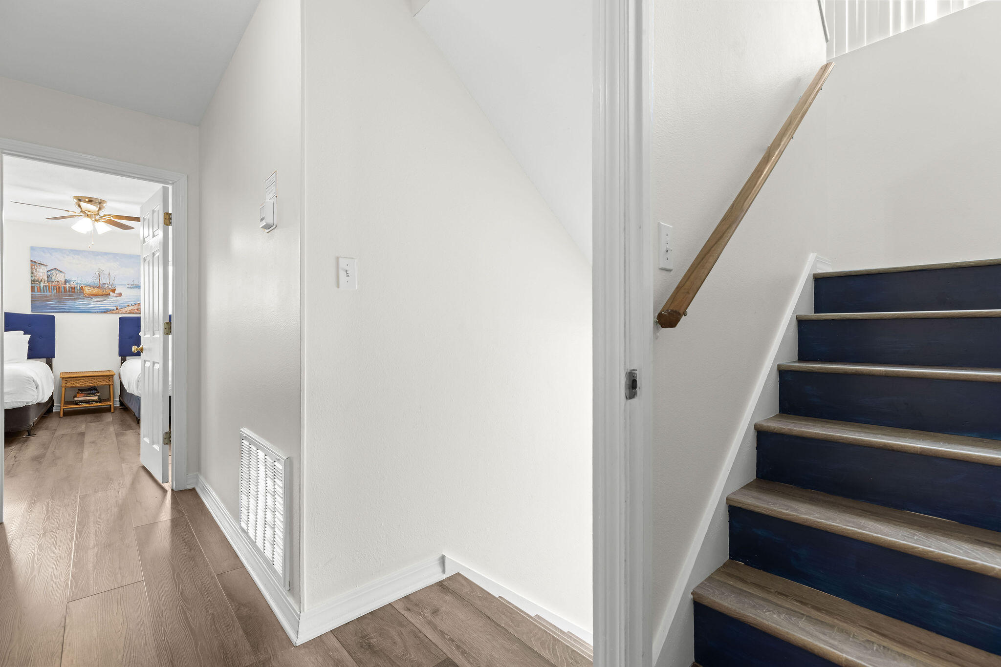 91 Matthew Boulevard Destin, FL 32541 - Photo 72 of 85 a view of a hallway with wooden floor and entryway