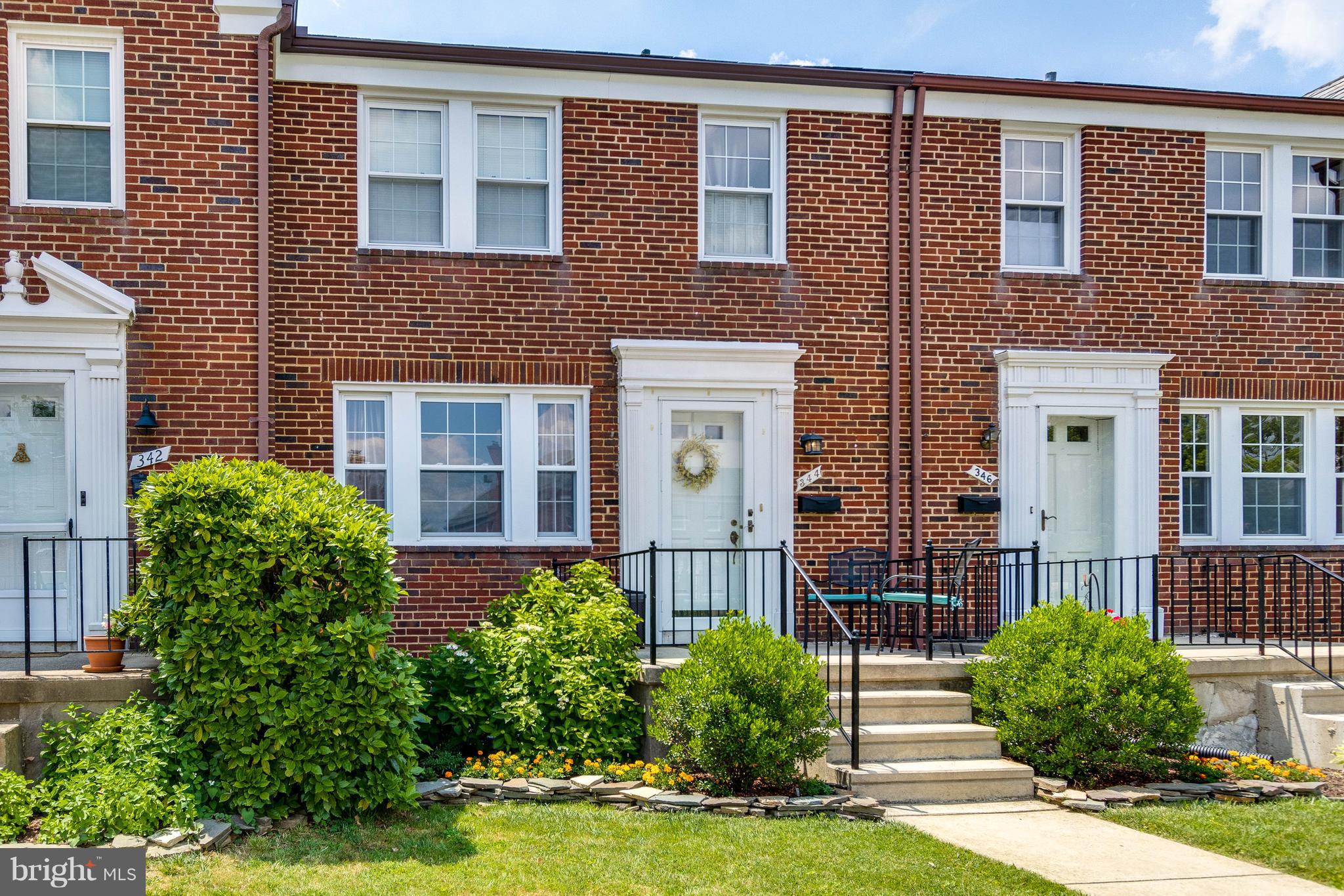 344 Greenlow Road Baltimore, MD 21228 - Photo 1 of 27 a front view of a house with garden