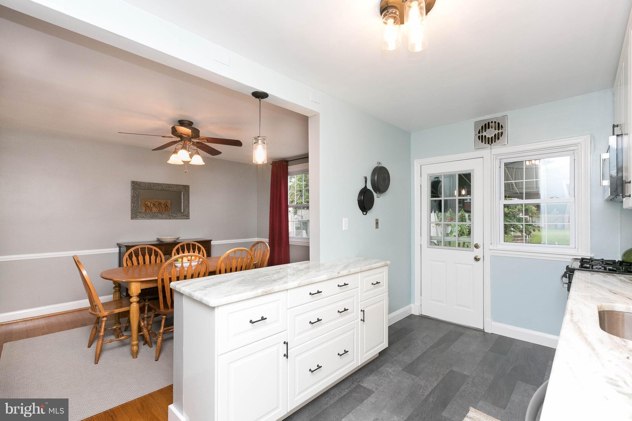 344 Greenlow Road Baltimore, MD 21228 - Photo 11 of 27 a bedroom with furniture and wooden floor