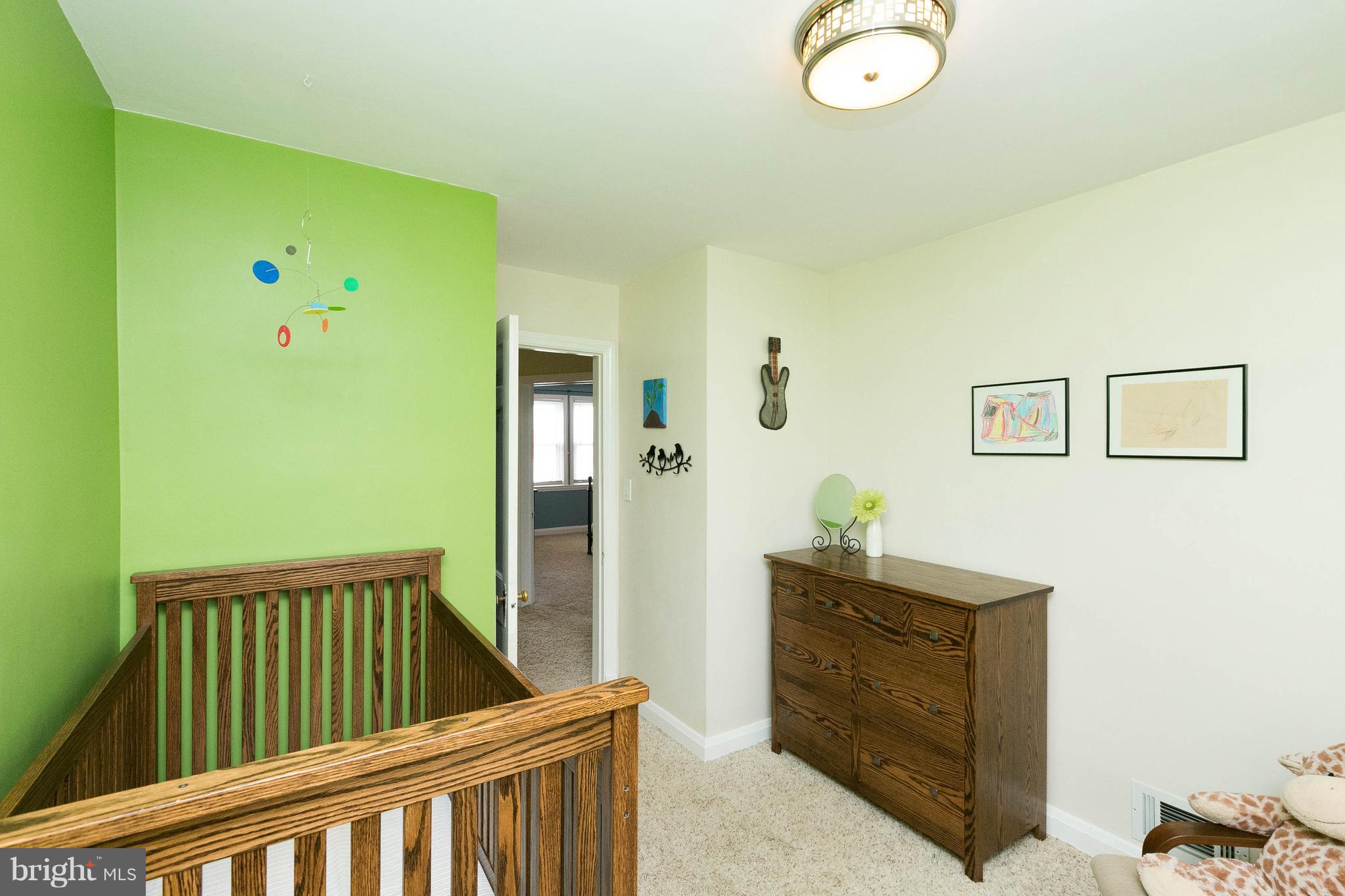 344 Greenlow Road Baltimore, MD 21228 - Photo 21 of 27 a view of a hallway with windows