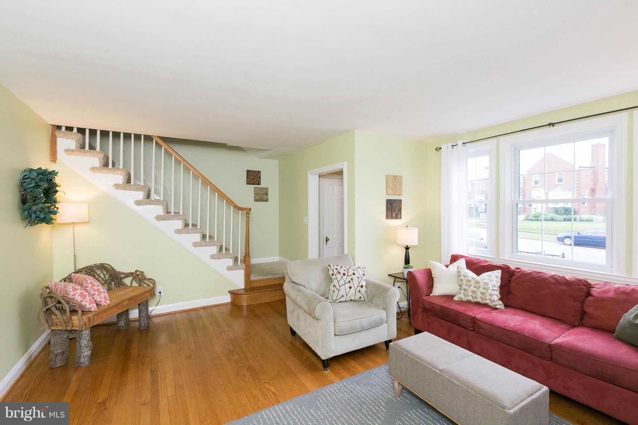 344 Greenlow Road Baltimore, MD 21228 - Photo 6 of 27 a living room with furniture and wooden floor