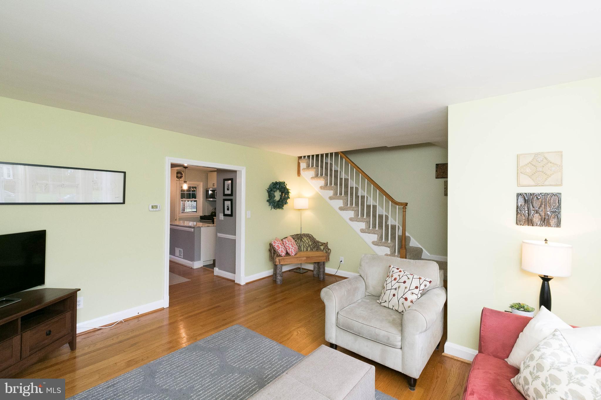 344 Greenlow Road Baltimore, MD 21228 - Photo 7 of 27 a living room with furniture and a flat screen tv
