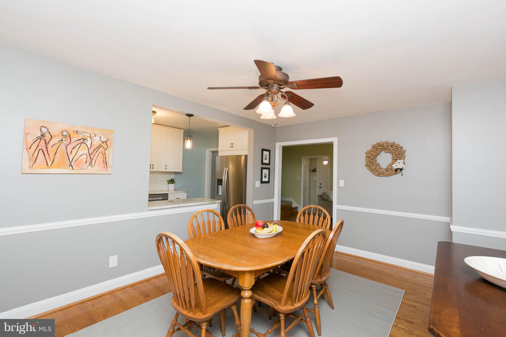 344 Greenlow Road Baltimore, MD 21228 - Photo 10 of 27 a dining room with furniture and window