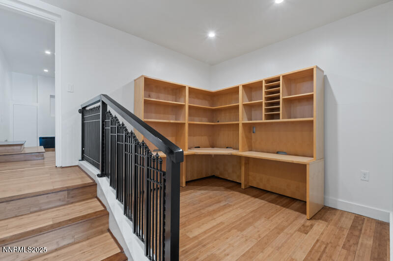 850 West 11th Street Reno, NV 89503 - Photo 13 of 31 a view of an empty room with wooden floor and stairs