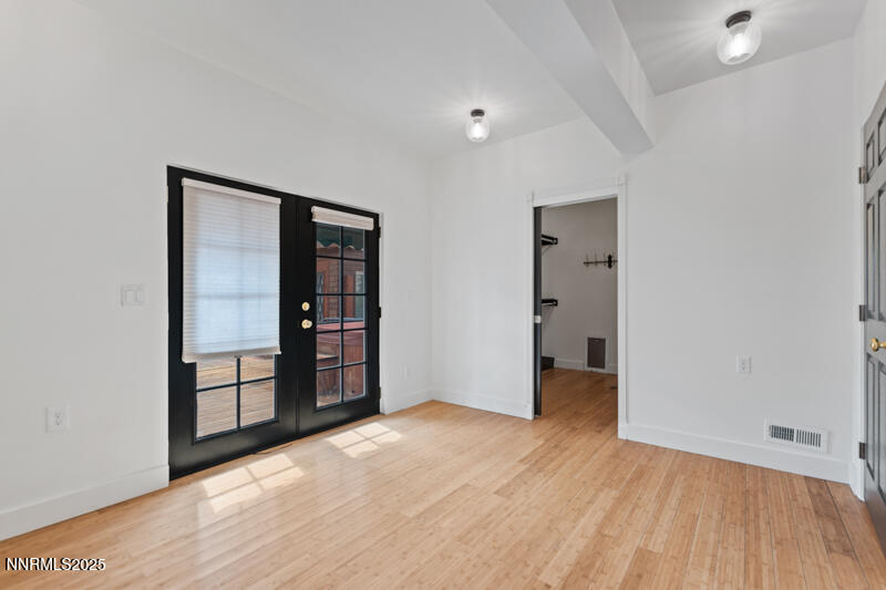 850 West 11th Street Reno, NV 89503 - Photo 15 of 31 an empty room with closet and wooden floor
