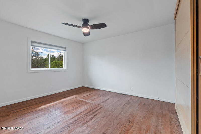 850 West 11th Street Reno, NV 89503 - Photo 20 of 31 a view of empty room with wooden floor and fan