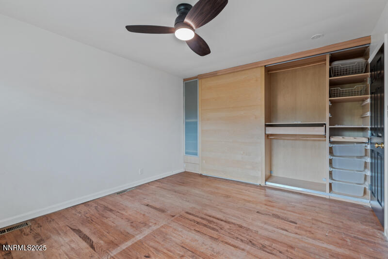 850 West 11th Street Reno, NV 89503 - Photo 21 of 31 a view of an empty room with a window and wooden floor