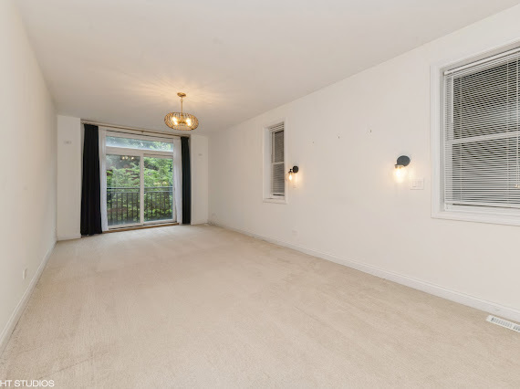 1347 West Fillmore Street, Unit A1 Chicago, IL 60607 - Photo 16 of 21 a view of an empty room with a window