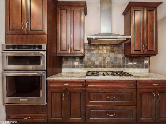 1347 West Fillmore Street, Unit A1 Chicago, IL 60607 - Photo 3 of 21 a stove top oven sitting inside of a kitchen