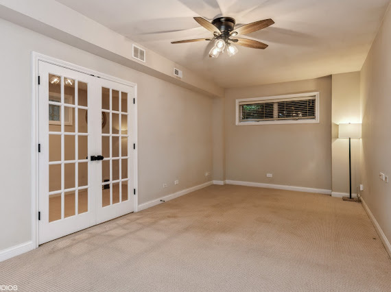 1347 West Fillmore Street, Unit A1 Chicago, IL 60607 - Photo 7 of 21 a view of an empty room with a window