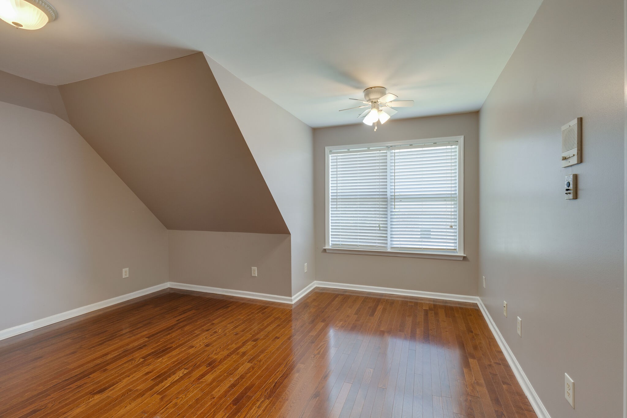 2017 Viewpointe Way Columbia, TN 38401 - Photo 13 of 24 wooden floor in an empty room with a window