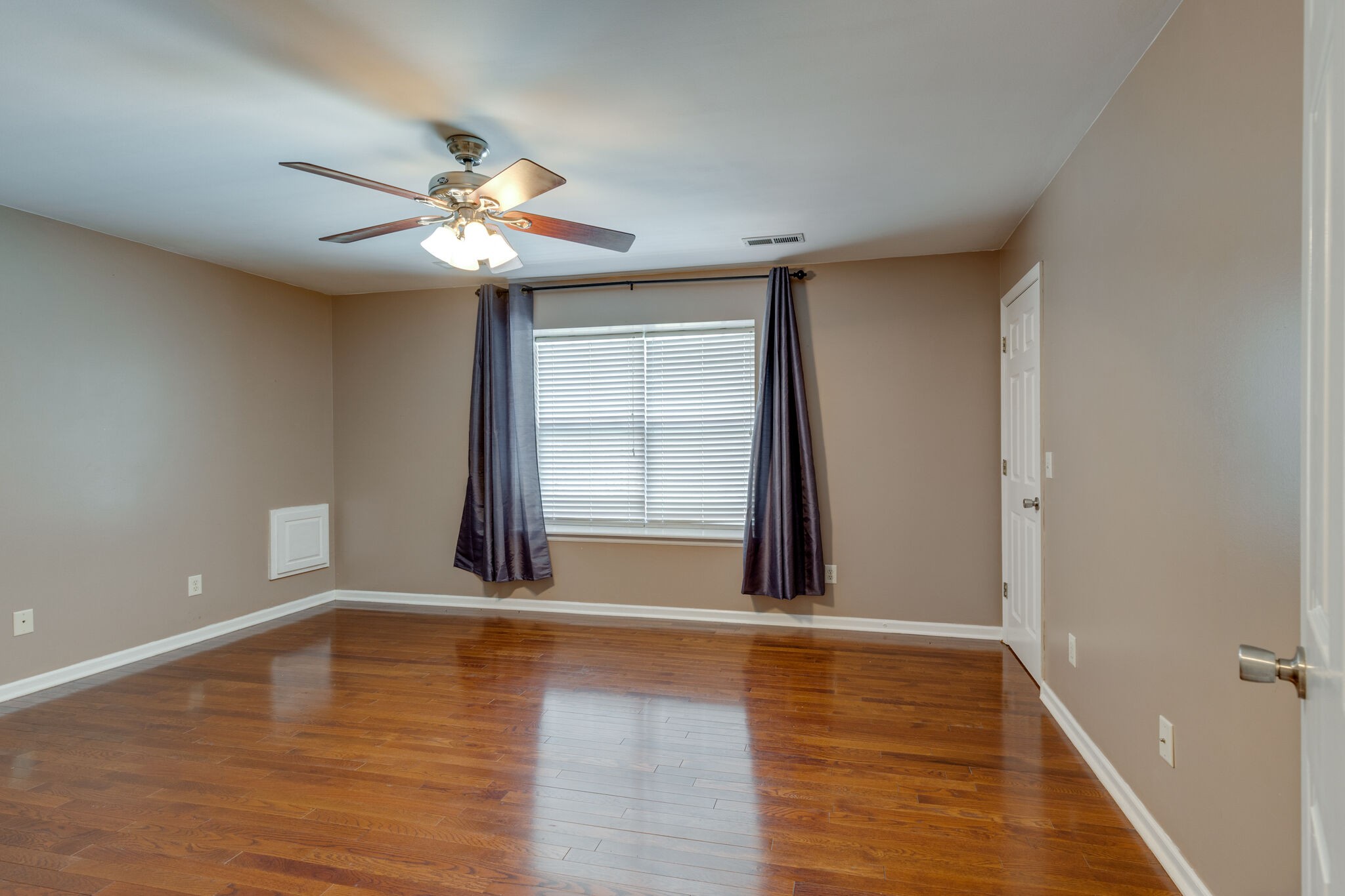 2017 Viewpointe Way Columbia, TN 38401 - Photo 16 of 24 a view of an empty room with window and wooden floor